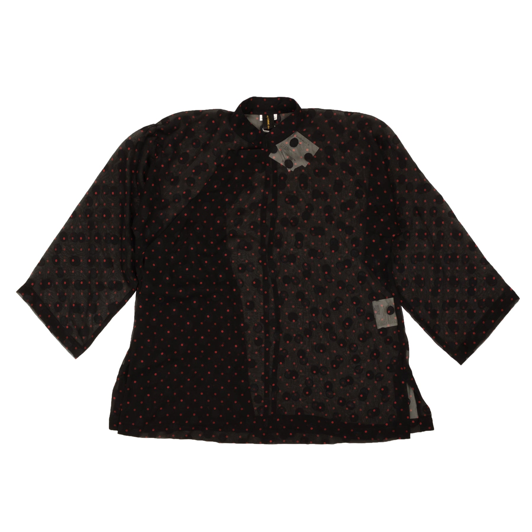 Schwarze und rote Seidenbluse mit Tupfen