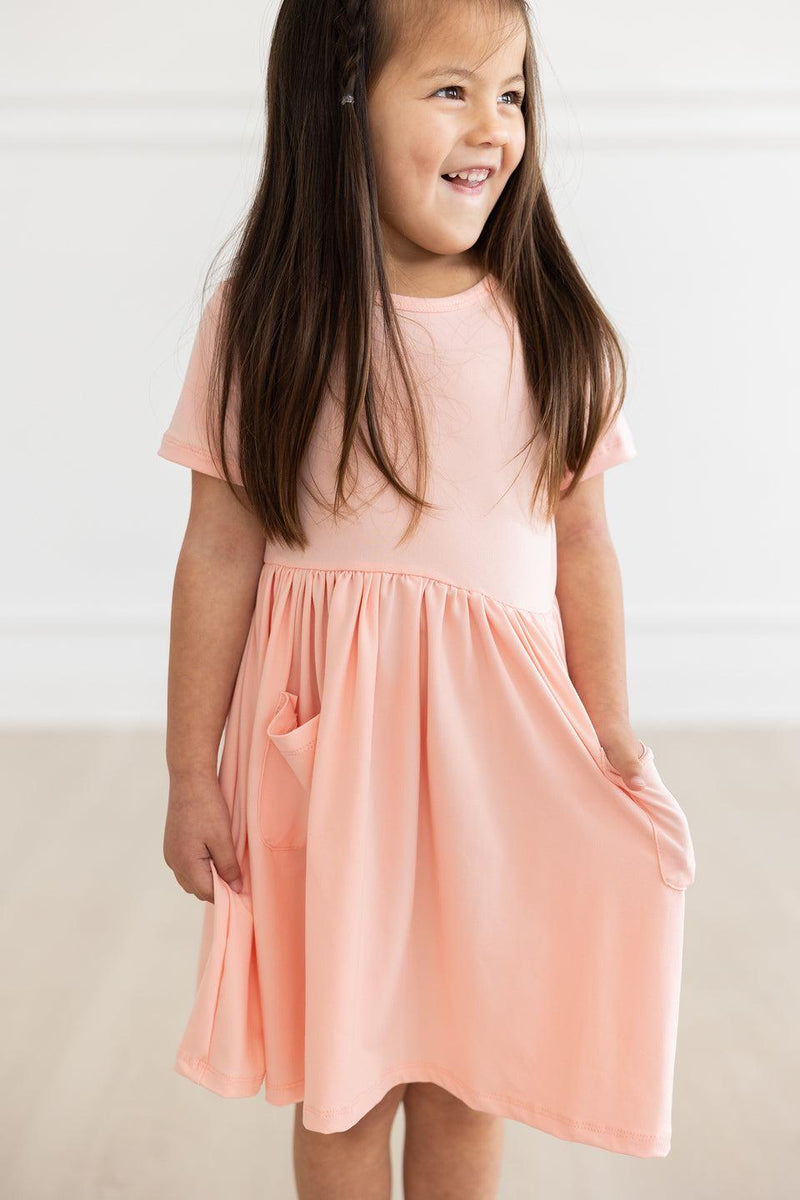 Pfirsich S / S Tasche Twirl Kleid