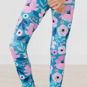 Twirling in blaugrünen Leggings