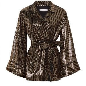 Una Paillettenjacke in Gold
