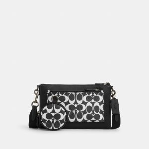 Coach outlet holden crossbody in signatur canvas