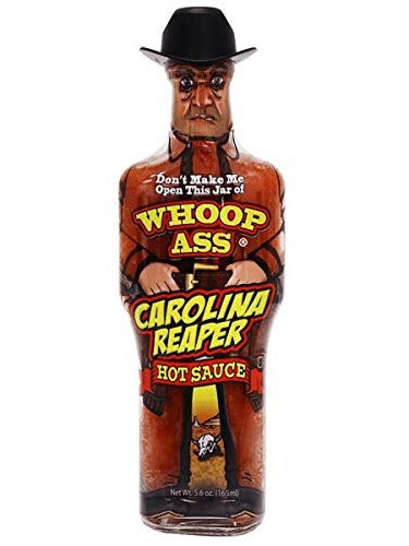 Chilisauce Whoop Ass Chipotle in einem Cowboy geformte Glasflasche mit Kuh