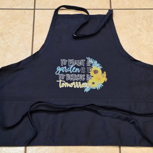 „Einen Garten pflanzen“-Schürze