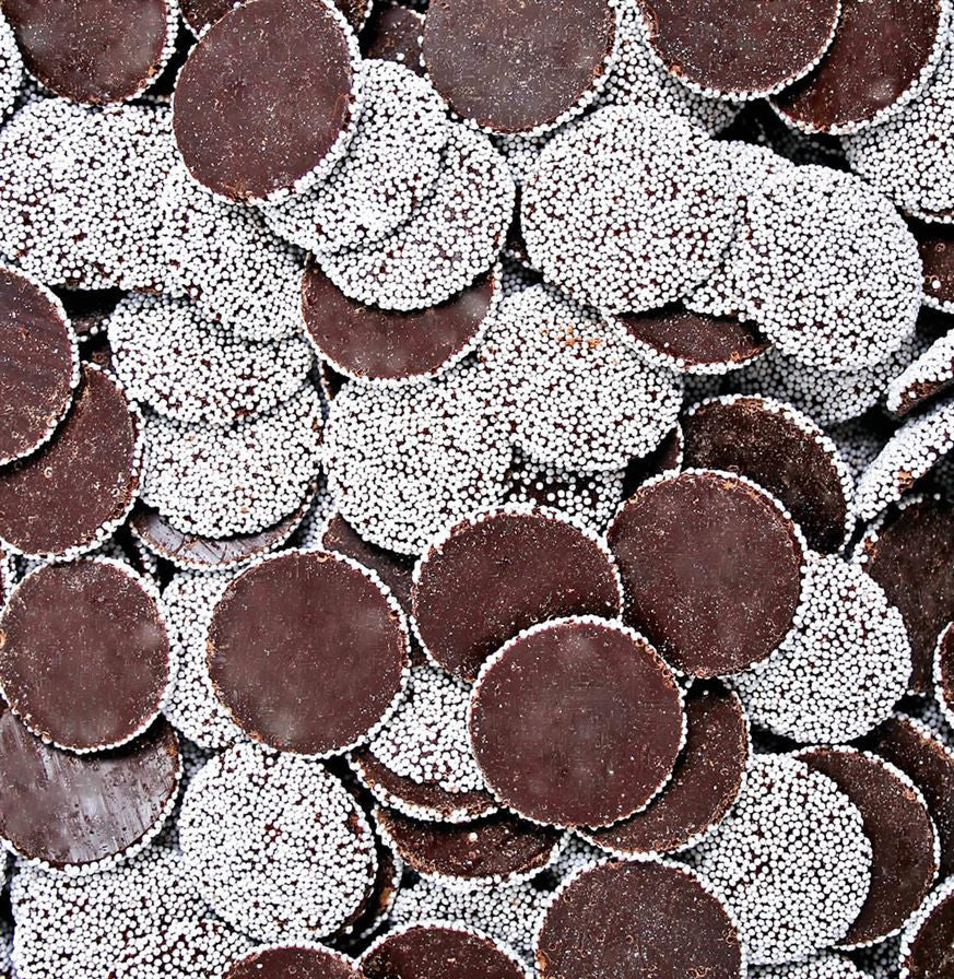 Dunkle Schokolade Nonpareils mit weißen Samen