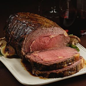 Knoblauch und Kräuter reiben Prime Rippen gebraten